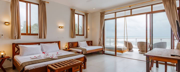 Strandvilla – Sun Suite met toegang tot het zwembad / direct zeezicht