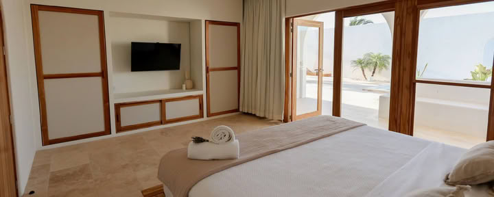 Eenpersoonskamer met kingsize bed en eigen badkamer